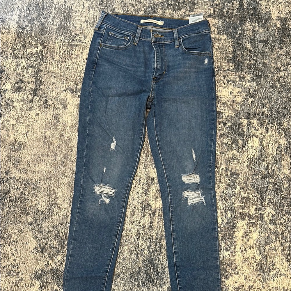 Women's Distressed Blue Jeans